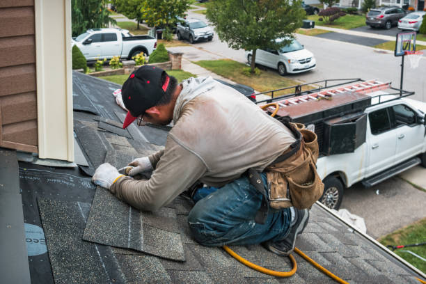 Professional Flat Roof Repair technician working in Paris, OH